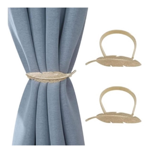 IH Casa Decor Set Of 2 Curtain Tiebacks Feather Rose Gold holding back a blue curtain, featuring rose gold metallic feather-shaped fabric tiebacks ideal for curtain holdbacks and drapery hardware, adding a decorative touch to window coverings.