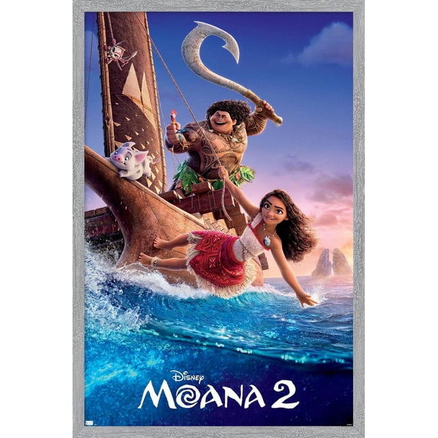 Disney Moana 2 - One Sheet Wall Poster, 22.375" x 34" framed, depicting Moana swinging from a rope over vibrant blue ocean waves beside a traditional Polynesian sailing canoe with Maui holding a large fishhook. The poster has a premium satin finish and silver frame, set against a sunset sky with distant rocky islands, featuring characters Pua the pig and Hei Hei the rooster. Suitable for home décor and party wall art.