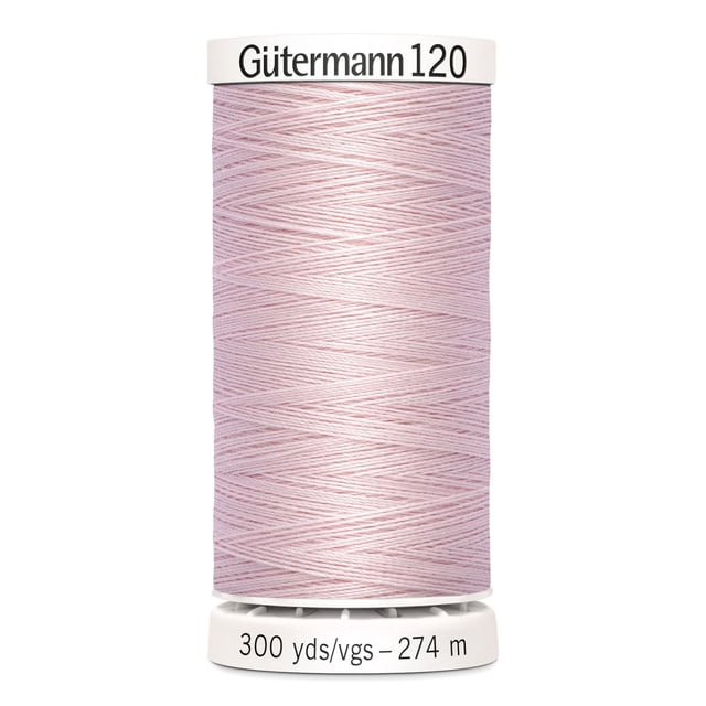 Gutermann 120 100% polyester all purpose thread spool in pale pink with white plastic ends labeled with brand and 300 yards (274 meters) length, suitable for machine and hand sewing cotton, synthetics, and natural fibers, often used for crafts and mending projects.