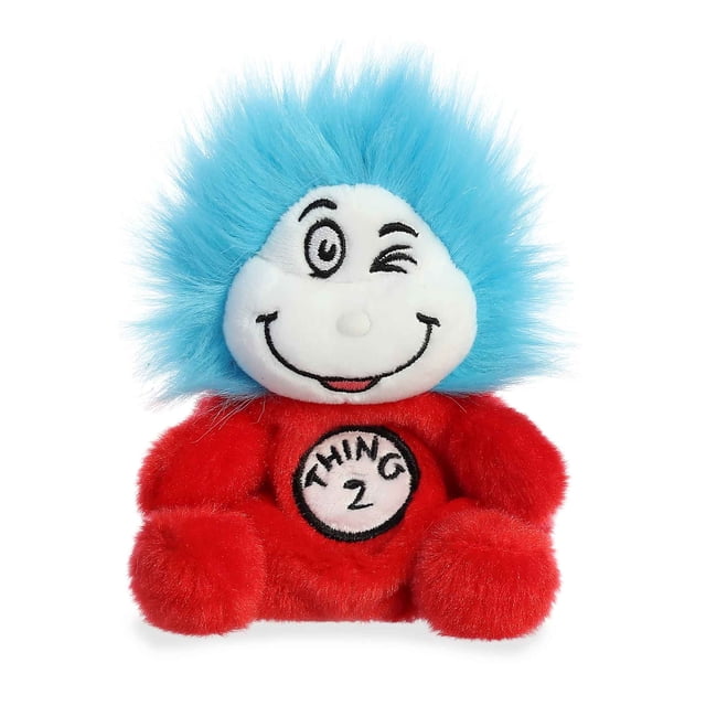 Aurora - Palm Pals Dr. Seuss - Thing 2 5-inch plush toy featuring a playful design with soft, fluffy red fabric and bright blue fuzzy hair. The plush has a cheerful winking expression and a circular 'Thing 2' emblem on its chest. Made with high-quality materials and filled with bean pellets for stability, it is suitable for all ages.