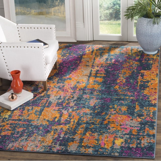 SAFAVIEH Madison Ivory Abstract Area Rug featuring a vibrant abstract pattern in orange, purple, blue, and ivory, power loomed with durable polypropylene yarns. Displayed on hardwood flooring under a white studded armchair and next to a woven planter, suitable for modern and transitional home decor and often used as a stylish accent rug in living rooms.