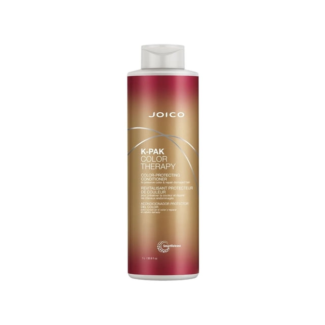 Joico K-Pak Color Therapy Conditioner in a 33.8 oz bottle with a red-to-gold gradient label and white flip-top cap, formulated to nourish and hydrate damaged, colour-treated hair, enhancing shine, movement, and styling responsiveness, ideal for multi-processed hair.