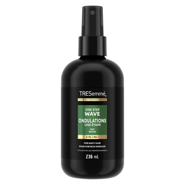 TRESemmé Wave 5-in-1 Leave-in Hair Mist in a black 236 mL spray bottle with green and gold label, designed to define waves, add volume, control frizz with soft hold, heat protect, and add shine for wavy hair.