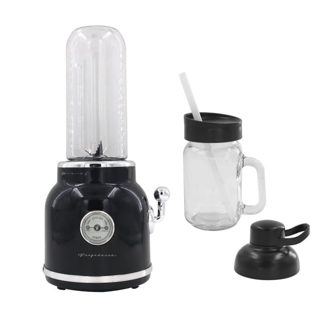 Frigidaire 300W Retro Smoothie Blender in black with chrome lever and dial, clear tall blending jar attached, 600ml BPA-free mason jar with handle and black lid with straw, plus an extra black travel lid, on white background, suitable for personal and portable use.