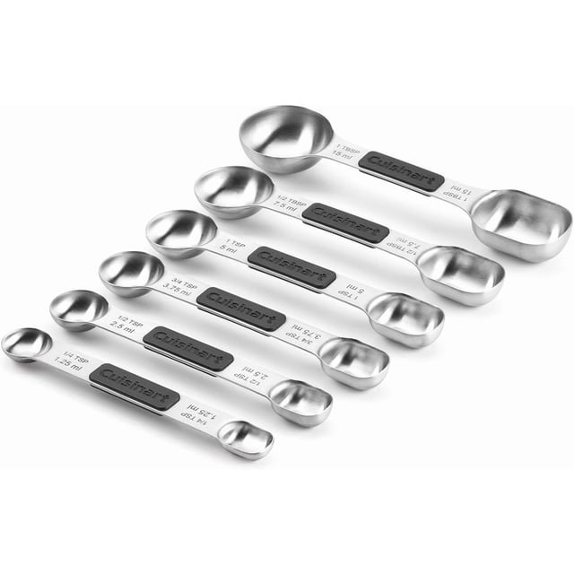 Cuisinart Stainless Steel 6-Piece Magnetic Measuring Spoons Set with six stainless steel spoons featuring slim heads and black magnetic strips embossed with the Cuisinart logo, sizes include 1 tbsp, ½ tbsp, 1 tsp, ¾ tsp, ½ tsp, and ¼ tsp with measurement markings on both sides for precise ingredient measuring, ideal for kitchen use and suitable for measuring small craft materials.