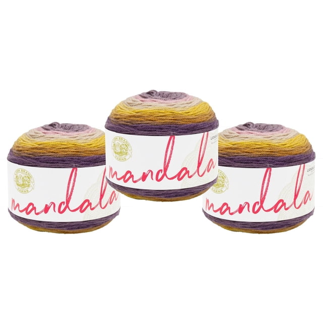 Lion Brand Yarn Mandala Multicolor Light DK Acrylic 3 Pack Yarn featuring three skeins with gradient colors of purple, yellow, pink, and beige, each wrapped in a white label with red 'mandala' text and the Lion Brand logo, suitable for crocheting scarves, shawls, or hats.