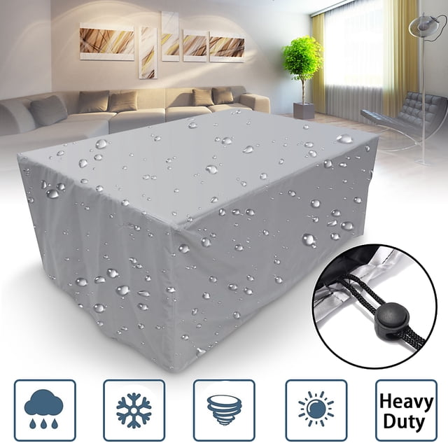 Housse d'Ensemble de Meubles Multifonction pour Meubles de patio, de Jardin Ou de Parc, de Forme Rectangulaire et Argentée avec Intérieur Noir. Fabriquée en PVC Imperméable avec protection UV, Serrage à Cordon et Résistance à la Pluie, à la Neige, à la Poussière et aux Fientes d'Oiseaux. Conçue pour Prolonger la Durée de Vie des Meubles à l'Extérieur.