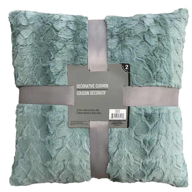 Hometrends Solid Fur Decorative Pillow set of 2 in teal, made of soft plush fabric with a textured fur pattern, includes square pillows sized 18x18 and 20x20 inches, wrapped with gray ribbons and a central label, ideal for adding comfort and style to living or bedroom spaces, also suitable as cozy floor cushions.