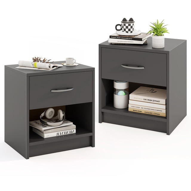 Gymax 2 PCS Nightstand with Drawer, featuring a sleek gray finish and modern design. Each nightstand includes a spacious 15'' x 11'' tabletop for lamps or decor, a pull-out drawer with a handle for private storage, and an open shelf for books or magazines. Made from engineered wood and HDF, these nightstands are supported by a stable base with anti-slip pads for floor protection. Ideal for bedrooms, living rooms, or studies, the compact dimensions of 15'' x 11'' x 16'' make them suitable for small spaces.