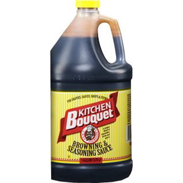 Kitchen Bouquet - 1 Gallon Jar, a large plastic container with a handle, featuring a yellow label with red and white branding. This jar contains browning and seasoning sauce, a versatile culinary ingredient often used to enhance the flavor and color of gravies, sauces, and other dishes. A kitchen essential for professional and home cooks.