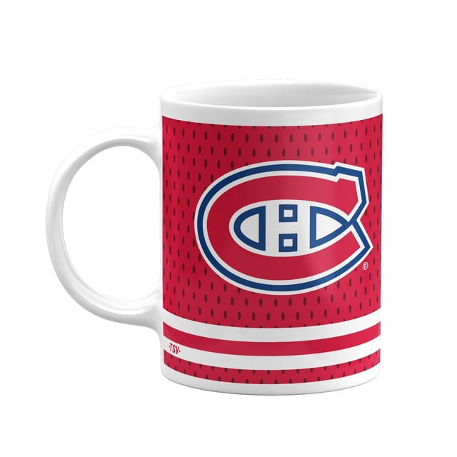 SET OF 2 11OZ OFFICIALLY LICENSED NHL COFFEE MUGS MONTREAL CANADIENS with white ceramic mugs featuring a red background with small black dots, the Montreal Canadiens logo in red, white, and blue, two white horizontal stripes near the base, and large handles for easy gripping, microwave and dishwasher safe.