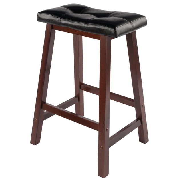 Winsome Mona Cushion Saddle Seat Counter Stool with black faux leather padded saddle seat featuring button accents and contrast stitching, solid walnut wood frame with square legs and footrest bars, 24.8-inch counter height suitable for kitchen, bar, or small spaces.