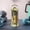 Green, variant on 1.5 Liter Spacious Sports Water Bottle with Straw, Leakproof Shatterproof, Built-in Handle Doubles as Phone Stand, Measurement Markings, 1-Pack