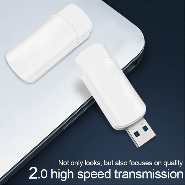 WIFKLSIIPG Clé USB Clé Mémoire Clé USB 512 Mo USB2.0 Clé USB Haute Vitesse Clé USB au design Blanc Épuré. l'Image Montre Deux Clés USB, l'Une avec Son Connecteur USB Exposé et l'Autre avec Son Capuchon Activé, Placée sur un Bord d'Ordinateur Portable. l'Interface USB 2.0 Assure des Vitesses de Transfert de Données Rapides, Convient au Stockage et au Transfert de Fichiers comme la Musique, des Images et des applications. Compatible avec Divers Systèmes d'Exploitation, Y Compris