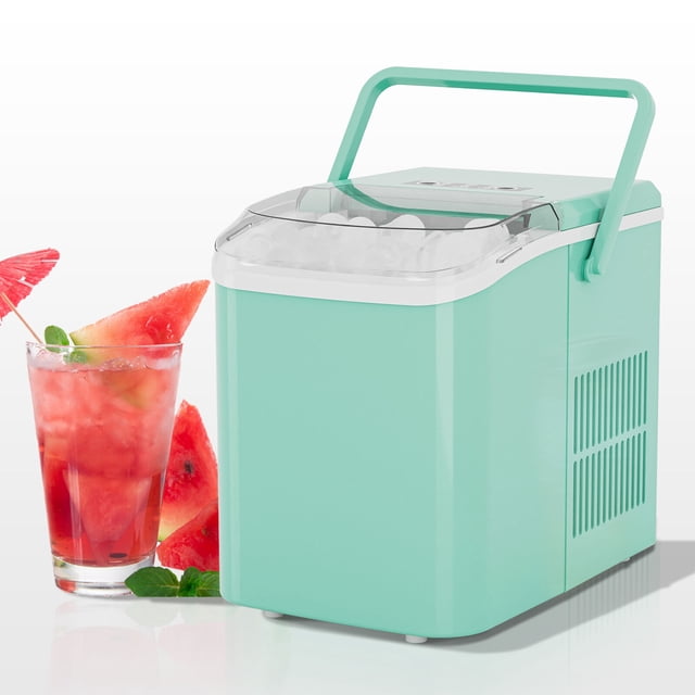 edx Portable Countertop Ice Maker in green with a self-cleaning feature, handle, and ice scoop. It produces 9 bullet-shaped ice cubes in 6 to 8 minutes and has a 2-liter water tank capable of making up to 26 pounds of ice per day. The compact design includes a clear lid for monitoring ice levels and a quiet operation below 40dB. Shown next to a glass of watermelon drink with ice cubes.