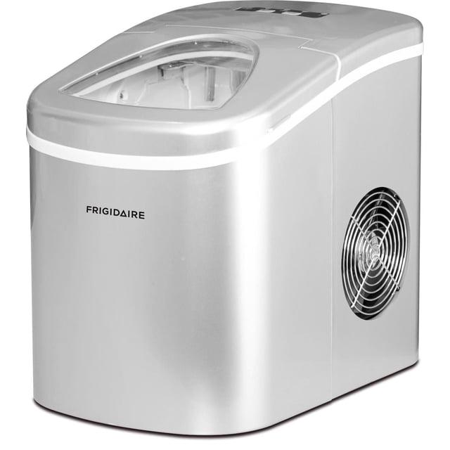 Frigidaire Machine à Glaçons Compacte de Comptoir avec une Capacité de 26 Lb de production par Jour en Argent, Affichant un Couvercle Supérieur Transparent, un Ventilateur de ventilation Latérale et une Finition Métallique Lisse. Elle Offre une Capacité de Panier à Glace de 2,65 Lb et des Voyants Indicateurs pour une Utilisation Facile.