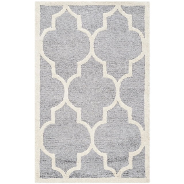 Safavieh Cambridge Kevin Geometric Area Rug in light grey and white, hand-tufted wool with plush cut pile and textured geometric quatrefoil pattern, ideal for adding modern American style to home or office accent spaces.