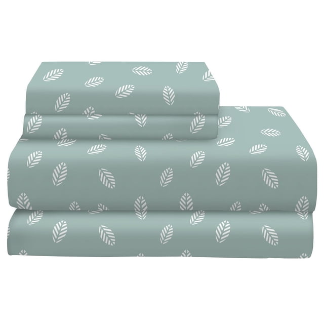 Johnson Home 200 TC Bed Sheet Set - Printed Cotton Sheets in muted green with white leaf pattern, folded to show flat sheet, fitted sheet, and pillowcases, made from breathable 200 thread count cotton for softness, durability, and year-round comfort.