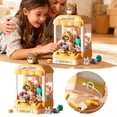 thumbnail image 1 of Noehoiugi Machine à Griffes pour Enfants, Console de Jeu d'Arcade Électronique Musicale avec Son Réglable, Cadeau de Noël et d'Anniversaire pour Enfants, Comprend des Mini Jouets et 5 Pcs de Jeu, 1 of 6
