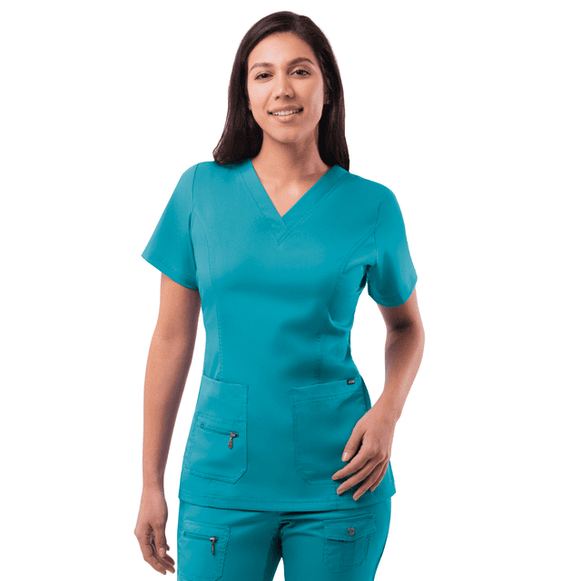 Adar Pro Scrubs For Women - Elevated V-Neck Scrub Top in a vibrant teal color. The tailored fit scrub top features a double-stitched V-neckline, curved princess seams on the front and back, and side vents for easy movement. It includes two front patch pockets and one zippered pocket for functionality. Made from a soft stretch performance twill fabric, it is wrinkle-resistant, odor-resistant, and designed for comfort and durability in healthcare settings.