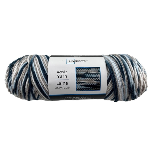 Mainstays Medium Acrylic Indigo Blues Yarn skein in a multi-color blend of indigo, blue, gray, and white, classic worsted medium weight acrylic yarn wrapped with a label showing knitting pattern and brand name, machine washable and ideal for hand knitting and crocheting projects.