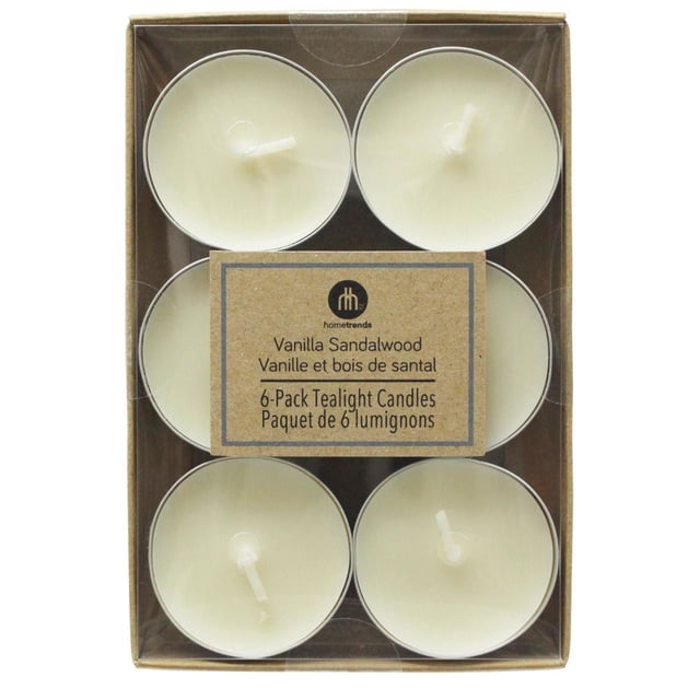 Hometrends Vanilla Sandalwood Scented 6-Pack Tealight Candles with ivory wax and cotton wicks in a brown cardboard box, suitable for indoor Christmas decorations and creating a warm, ambient fragrance.