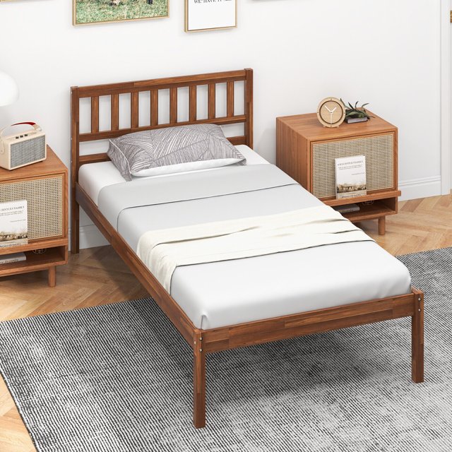 Gymax Twin Platform Bed with Headboard Solid Wood Leg Mattress Foundation Walnut. This retro-style bed features a solid wood frame with a walnut finish, an elegant slatted headboard, and sturdy plywood slats for reliable support. The bed frame includes an embedded design to keep the mattress in place and offers 12 inches of under-bed clearance for storage. Suitable for mattresses up to 6 inches thick, it is ideal for small bedrooms or apartments. Dimensions: 79.5'' x 42'' x 35.5'' (L x W x H).