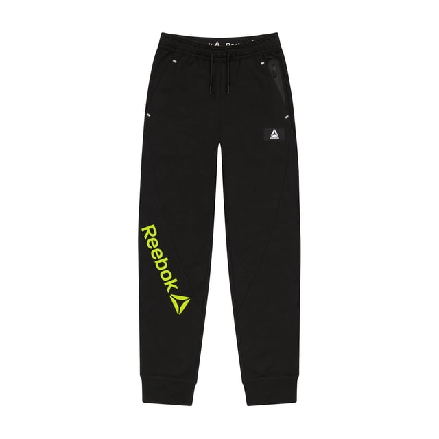 Reebok Garçons Advanced Tech Jogger en Tissu Éponge Noir avec Taille Élastique et Cordon de Serrage Intérieur, Deux Poches Latérales Incluant une Poche Zippée Collée, Poignets Côtelés et logo Reebok Delta Jaune Vif sur la Jambe Gauche, Fabriqué à Partir de 80 % Coton et 20 % polyester Tissu Éponge Français pour Chaleur et Confort, Idéal pour les Activités et les Tenues Décontractées.