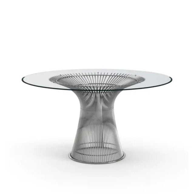 Palma Dining Table With Tempered Glass Top And Chrome Metal Base featuring a round clear tempered glass tabletop supported by a flared chrome metal wire base with vertical rods forming a conical shape, measuring 39 inches in diameter and 30 inches in height, suitable for modern dining rooms and often used as a stylish accent table.