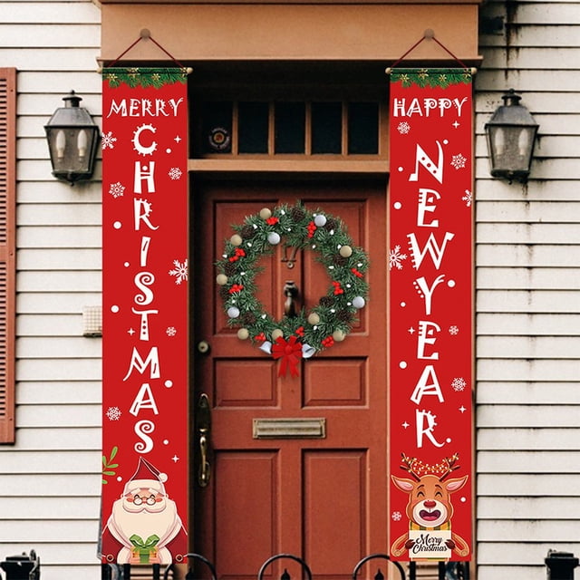 2Pcs Couplets Christmas Porch Front Door Hanging Banners Outdoor Flags Signs Holiday Decor. The image shows two red vertical banners hanging on either side of a front door, each featuring festive Christmas designs. One banner reads 'Merry Christmas' with a Santa Claus illustration, while the other reads 'Happy New Year' with a reindeer illustration. Both banners are adorned with snowflake patterns and greenery accents at the top. A Christmas wreath decorates the door, enhancing the holiday atmosphere. Made of durable oxford cloth, these banners are suitable for home, mall, or garden use during Christmas and holiday celebrations.