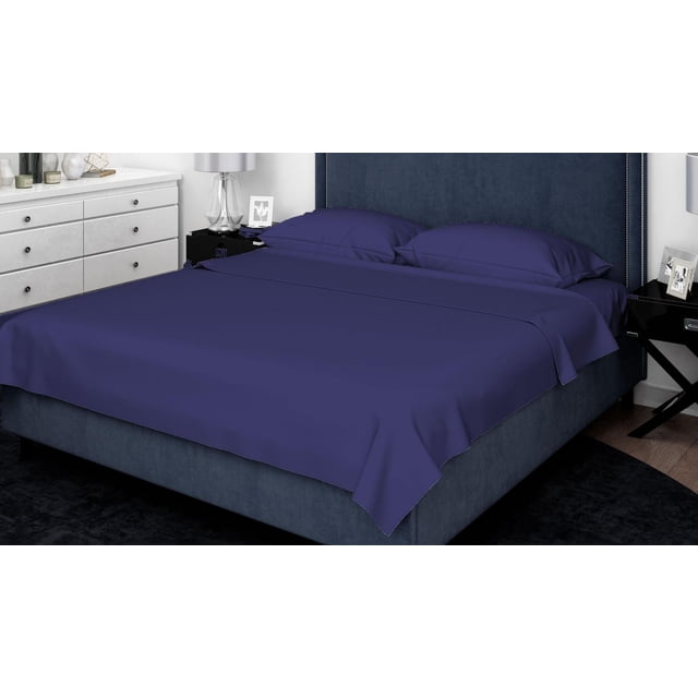 Johnson Home 300 Thread Count Combed Egyptian Cotton Sheet Sets in deep navy blue on a king-size bed with a dark blue upholstered headboard, featuring smooth, breathable, wrinkle-resistant fabric in a modern bedroom with white dresser and black nightstand.