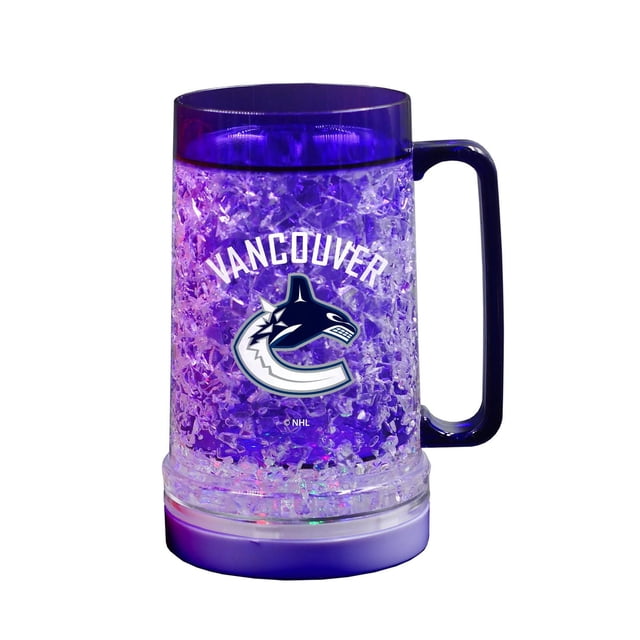 The Sports Vault Light Up Freezer Mug Vancouver Canucks with double-wall plastic and freezable crystal-gel insulation to keep drinks cold, featuring a printed Vancouver Canucks logo and a removable LED base with three light modes, shown front-facing with a blue handle and illuminated bottom, suitable for enjoying cold beverages while displaying team pride.