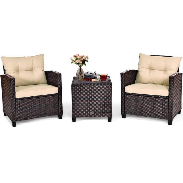 Giantex 3 Pieces Patio Furniture Set featuring two brown PE rattan wicker chairs with beige washable cushions and a matching square coffee table with a tempered glass tabletop. The set is designed for outdoor use in gardens, patios, balconies, or poolside areas. The chairs have wide armrests and thick cushions for comfort, while the table provides a sturdy surface for drinks or decor. The rattan material is weather-resistant, and the cushion covers are removable for easy cleaning.