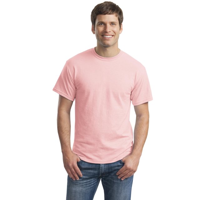 Gildan DryBlend Men 50 Cotton/50 Poly T-Shirt in a light pink colour, featuring a classic crew neck and short sleeves. The shirt is shown worn with blue jeans, highlighting its casual fit and versatile design. Suitable for men's casual wear, this product may include heat transfer or tearaway labels.