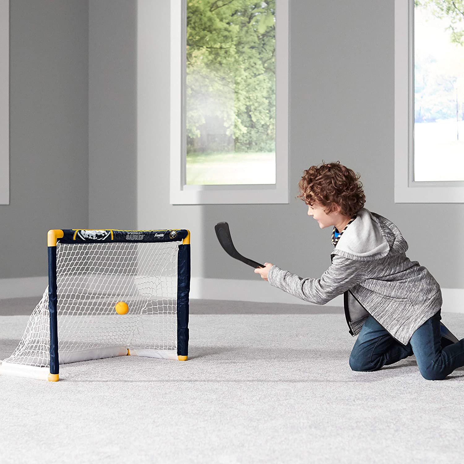 Franklin Sports Ensemble de mini hockey Sabres de la NHL – But de hockey intérieur pour enfants, ballon, 2 mini bâtons de hockey