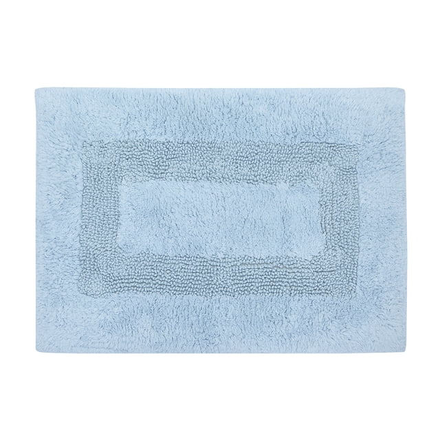 Mainstays Racetrack 100% Cotton Blue Bath Rug, 17" x 24", rectangular light blue bath rug with a textured racetrack pattern and plush cotton surface, featuring a non-slip backing for bathroom safety and machine washable convenience, also suitable as a soft mat for entryways or pet areas.