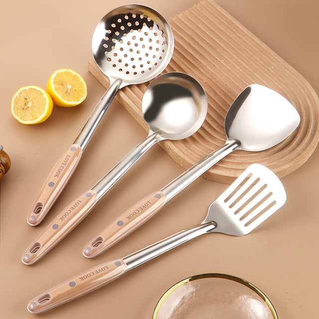 Sokhug 4-Pcs Cooking Utensils Set featuring stainless steel construction with faux wood grain ergonomic handles. Includes a wok ladle, slotted spoon, wok spatula, and slotted spatula, all heat-resistant and dishwasher safe. The utensils are displayed on a beige surface with a wooden trivet and lemon halves in the background.