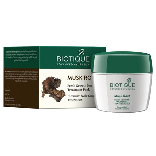 Biotique Fresh Growth Paquet de Traitement Nourrissant - Racine de Musc 230 g, un Traitement Capillaire avec un Pot Vert et Blanc à Côté de Sa Boîte d'Emballage. la Boîte Met en Valeur les Ingrédients du Produit, Y Compris Racine de Musc, bael, Réglisse et Muscade, Conçu pour Régénérer le Cuir Chevelu et Favoriser la Pousse des Cheveux.