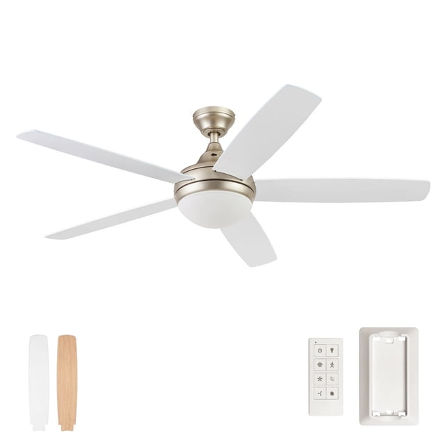 Prominence Home Ventilateur de Plafond Moderne de 52 Pouces en Fini Or Doux avec Lumière en Verre Givré et Télécommande. Conçu pour une Utilisation Intérieure, Il Comprend 5 Pales à Double Finition, des Ampoules DEL Écoénergétiques avec Luminosité Réglable et un Système à Trois Montages pour une installation Polyvalente. Idéal pour les Salons, les Chambres et les Bureaux à Domicile, Ce Ventilateur de Plafond Allie style et Fonctionnalité. Comprend un Support Mural pour Télécommande pour Plus de Commodité.