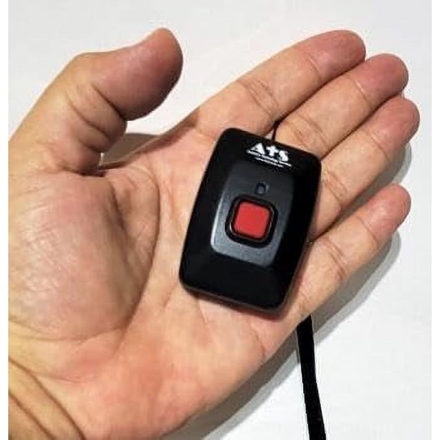 No Monthly Fees Life Guardian Medical Alarm Emergency Alert Phone System by Assistive Technology Services. A compact black wireless remote control pendant with a tactile red panic button, shown resting in a hand for scale. Designed for use with a landline, this medical alert system features a one-button emergency call function and optional social safety monitoring. Ideal for seniors or individuals requiring daily safety checks.