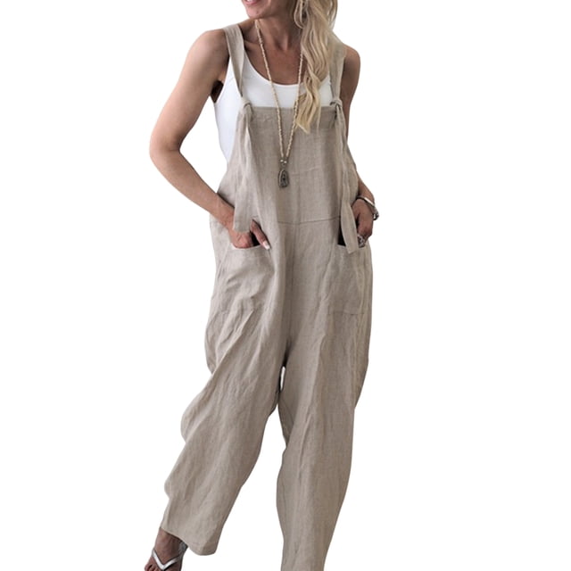Women's sleeveless linen wide leg jumpsuit rompers overalls harem pants in apricot color. Features adjustable shoulder straps, loose baggy fit, and wide-leg design. Made from a breathable polyester and spandex blend, suitable for casual, work, or party occasions across all seasons. Styled with a white tank top and accessorized with a necklace.