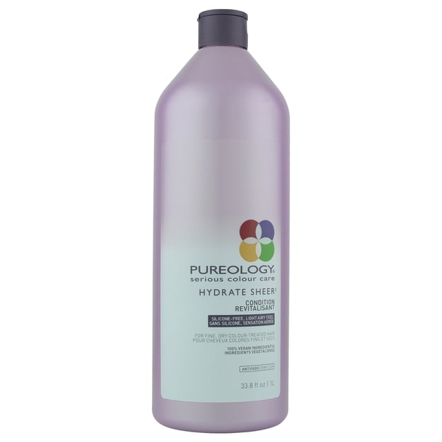 Pureology Hydrate Revitalisant Transparent Bouteille de 1 L avec un Corps aux Couleurs de Lavande et un Bonnet Gris Foncé. l'Étiquette Met en Valeur Sa Formule Légère Sans Silicone Conçue pour les Cheveux Fins, Secs et Colorés. le Produit Est 100 % Végane et Emballé dans 95 % de Matériaux Recyclés Post-Consommation.