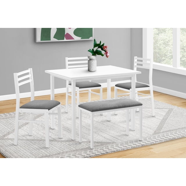 Monarch Specialties Dining Set, 5-piece set with a 40" rectangular white laminate table and white metal frame, including three armless chairs and a bench upholstered in grey cotton-linen fabric, placed on a light grey patterned rug in a bright dining room with grey walls and a large window, ideal for small kitchens or casual dining spaces.