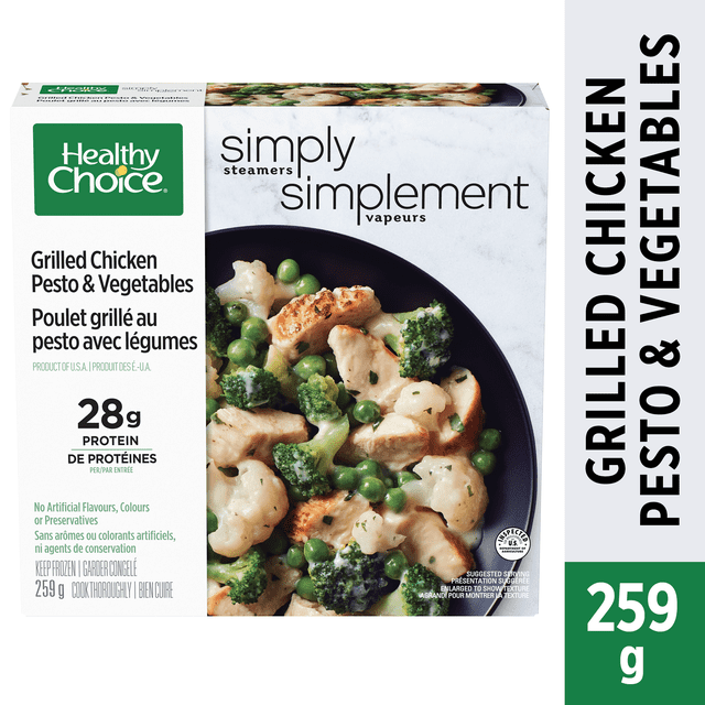 Healthy Choice Simply Steamers Grilled Chicken Pesto & Vegetables frozen dinner with grilled chicken breast, broccoli, cauliflower, and peas in basil pesto sauce on a black plate, 259 g package containing 28g protein, no artificial flavors or preservatives, bilingual English and French text.