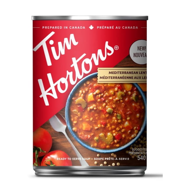 TIM HORTONS MEDITERRANEAN LENTIL canned soup, 540ml, with a red label featuring the Tim Hortons logo and a bowl of Mediterranean lentil stew with vegetables, prepared in Canada and ready to serve as a nourishing pantry food option.
