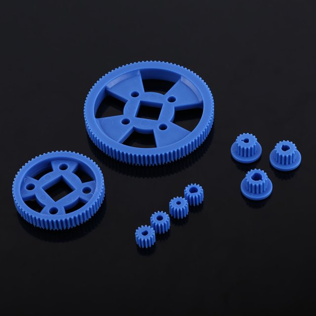 Motor Gear Set with blue plastic gears and pulleys, designed for extended durability and suitable for DIY model production, including robots, cars, and airplanes. Ideal for replacing old or broken parts in automotive pulleys and other applications. Displayed on a black background.