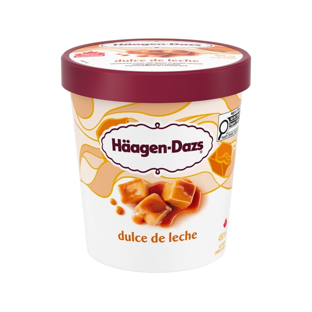 HAAGEN-DAZS Dulce De Leche Ice Cream, 450 ml tub with Häagen-Dazs logo and Dulce de Leche label, sweet cream ice cream swirled with golden caramel ribbons, made with Canadian dairy, often used as a dessert topping.