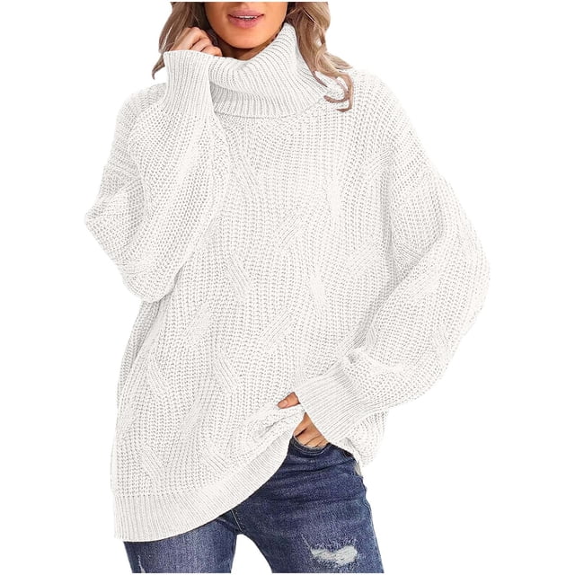 Yuyuzo women's oversized turtleneck sweater in a ribbed knit solid design, featuring long sleeves and a relaxed fit. The sweater is displayed in a light neutral colour, paired with distressed jeans for a casual and cozy style. Made from soft, lightweight material, it is ideal for layering during cooler weather.