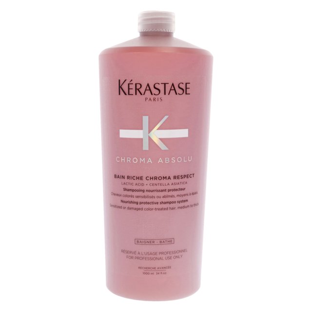 Chroma Absolu Bain Riche Respect Shampoo by Kérastase for Unisex in a 34 oz bottle. This gentle hydrating shampoo is designed for sensitized or damaged color-treated hair, suitable for fine to medium fiber. The bottle features a sleek pink design with the Kérastase logo prominently displayed.