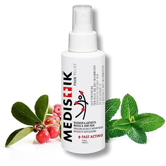 MEDISTIK Spray - Fast Acting Extra Strength Pain Relief Spray for Backache, Arthritis Muscle & Joint Pain, 118 ml. The white bottle displays bold black and red branding with text highlighting its dual-action formula for cooling and heating relief. Accompanied by fresh mint leaves and wintergreen berries, showcasing its natural ingredients. Ideal for topical joint and muscle pain relief.